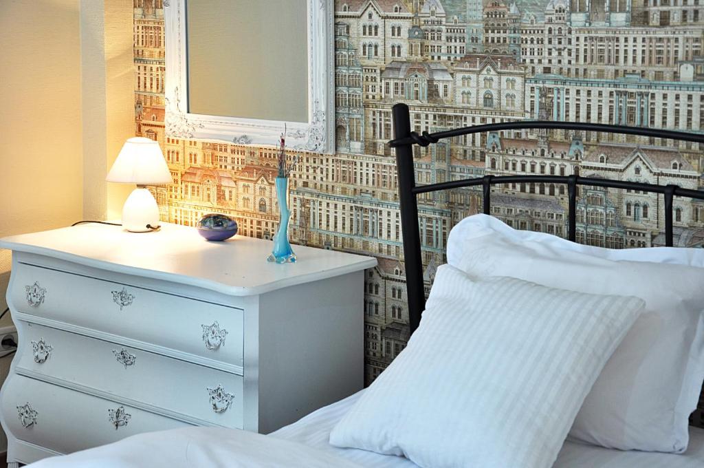 Postel nebo postele na pokoji v ubytování Hotel Gallery