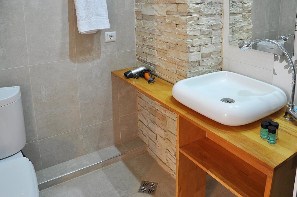 Koupelna v ubytování Hotel Gallery