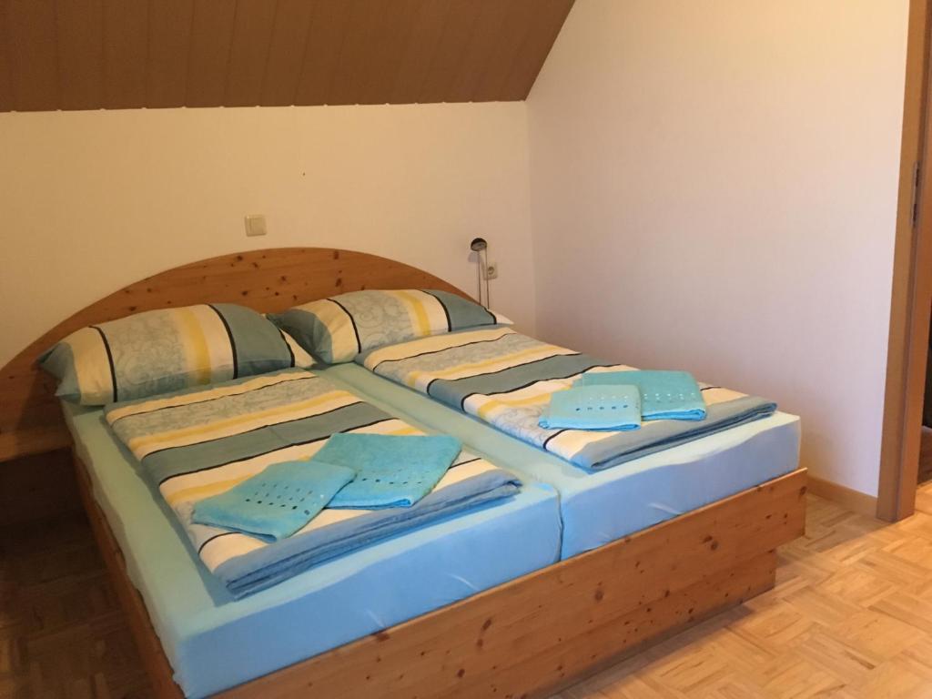 Postel nebo postele na pokoji v ubytování Hochfellner