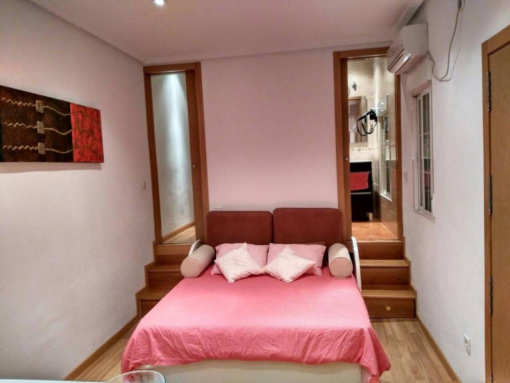 A bed or beds in a room at Estudio Nueva Numancia