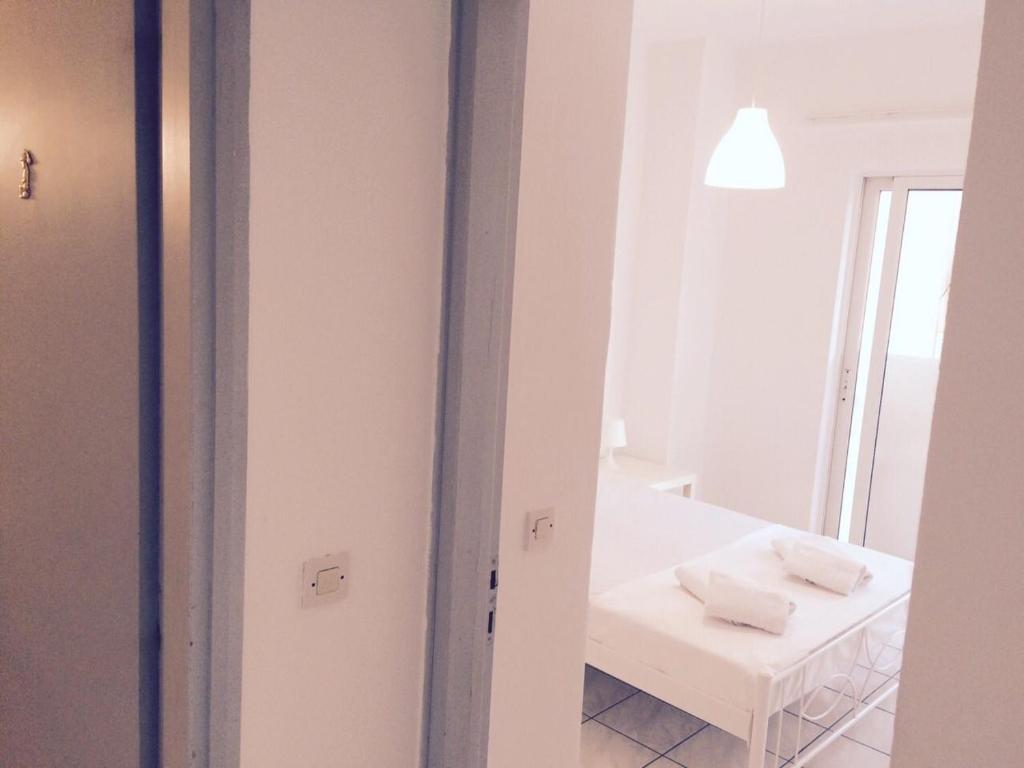 Posteľ alebo postele v izbe v ubytovaní Korona Beach Apartments II