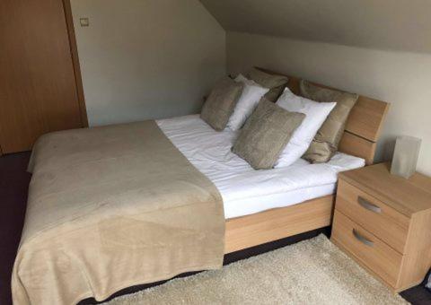 Кровать или кровати в номере Apartments Business Flats Brussels Airport