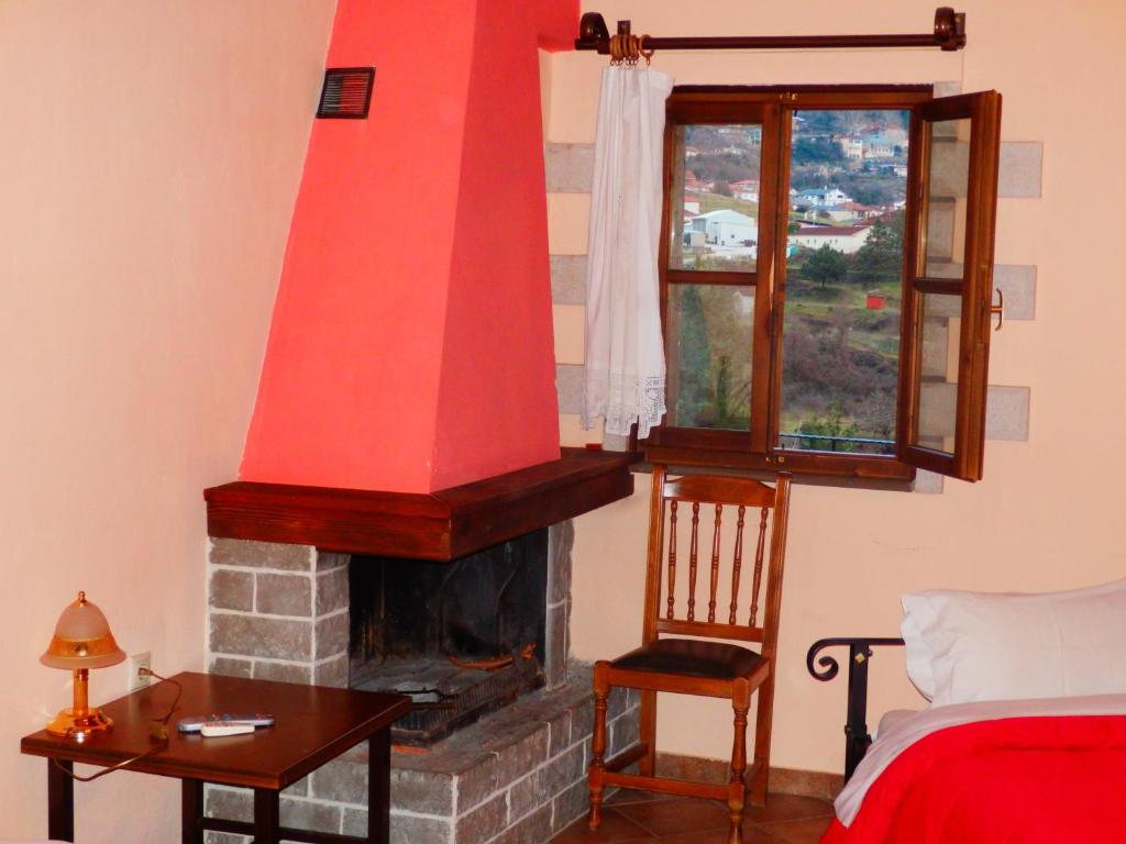 Postel nebo postele na pokoji v ubytování Konitsa Panorama