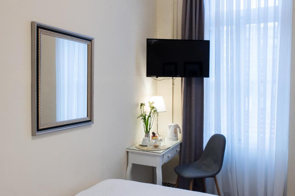 TV a/nebo společenská místnost v ubytování Old Town Inn