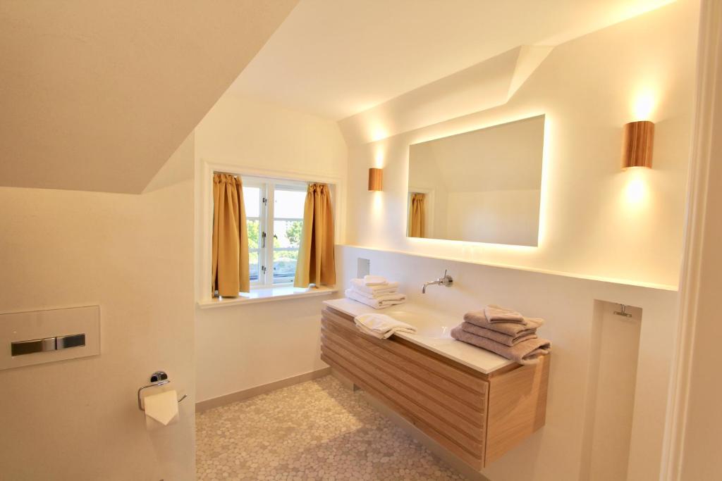 Postel nebo postele na pokoji v ubytování Ulenhof Appartements
