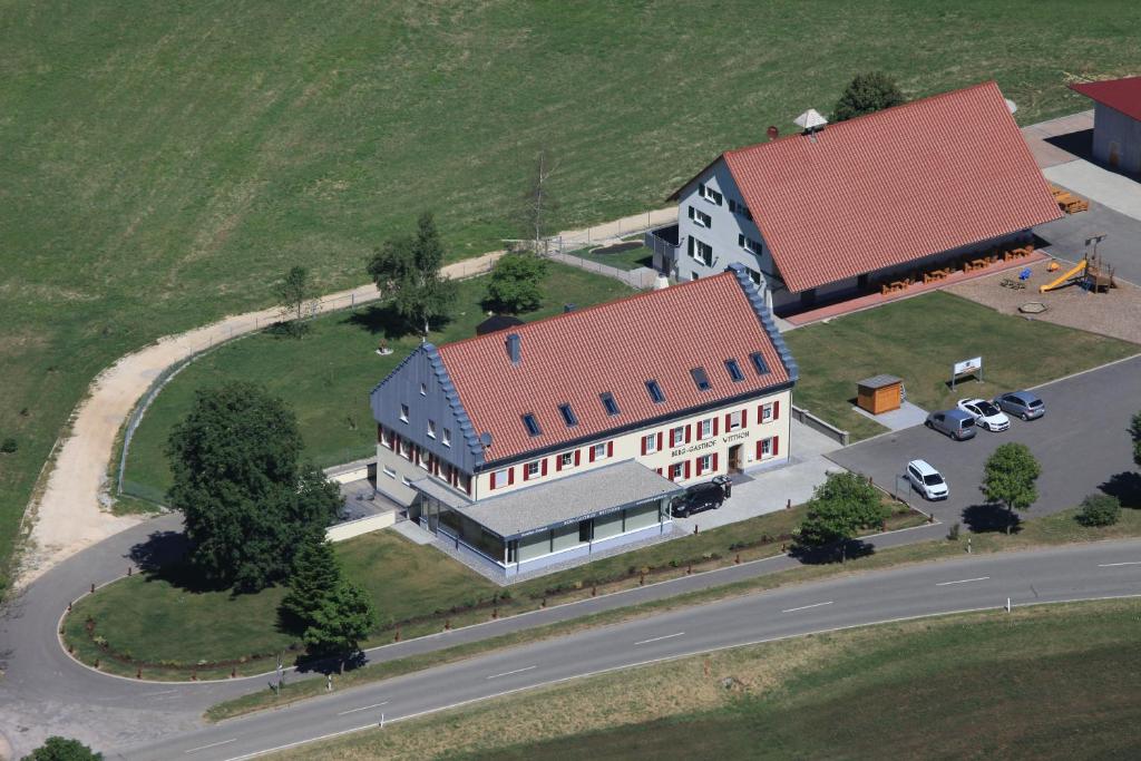 an overhead view of a large building with a red roof at Berg Gasthof Witthoh in Immendingen