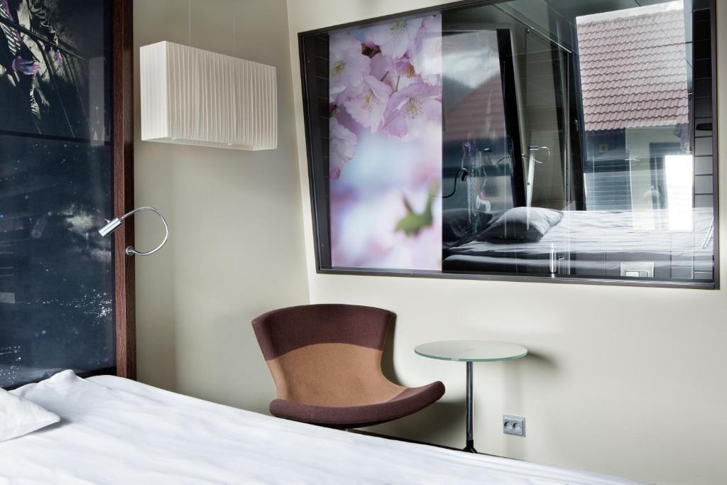 Postel nebo postele na pokoji v ubytování Comfort Hotel Square