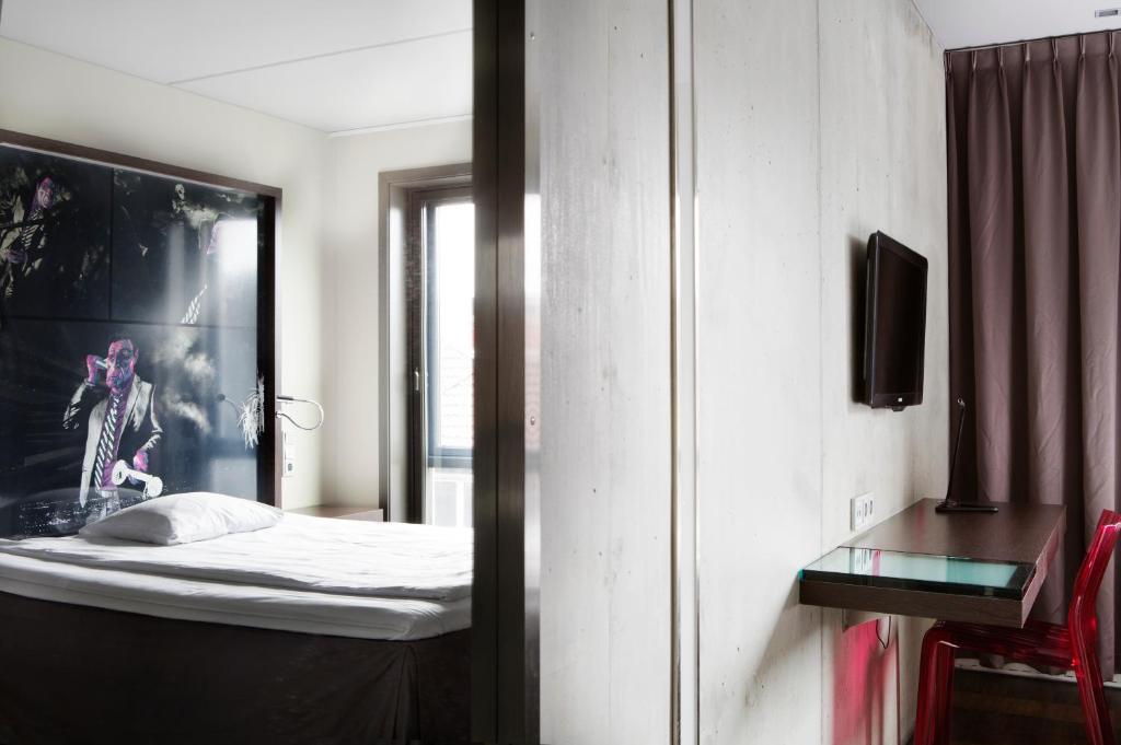 TV a/nebo společenská místnost v ubytování Comfort Hotel Square
