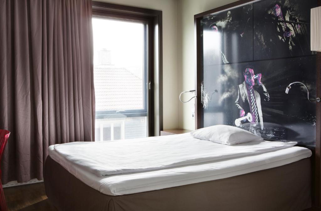 Postel nebo postele na pokoji v ubytování Comfort Hotel Square