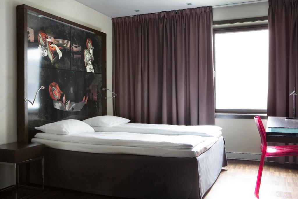 Postel nebo postele na pokoji v ubytování Comfort Hotel Square