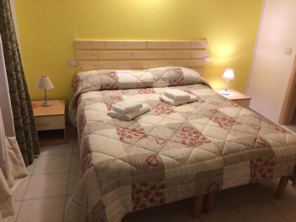 Postel nebo postele na pokoji v ubytování Ca' de Baran