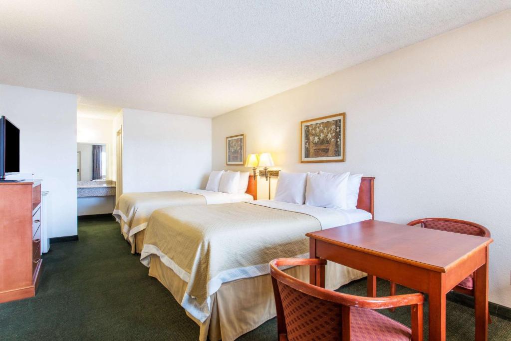 Postel nebo postele na pokoji v ubytování Travel Inn - Mesa