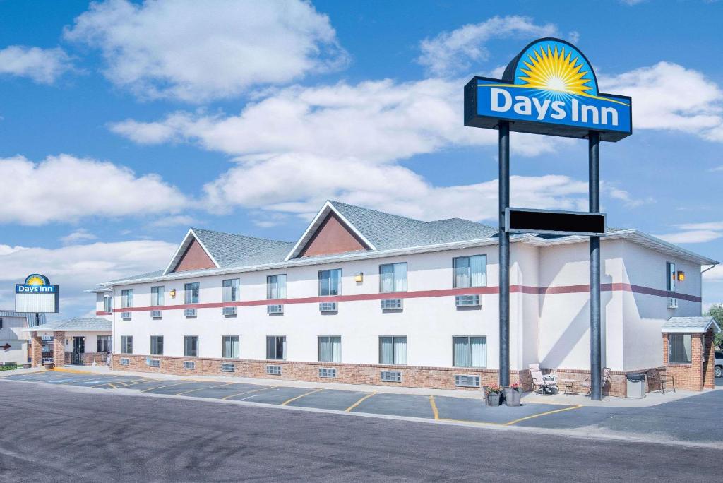 a days inn sign in front of a building at Days Inn by Wyndham Wall in Wall