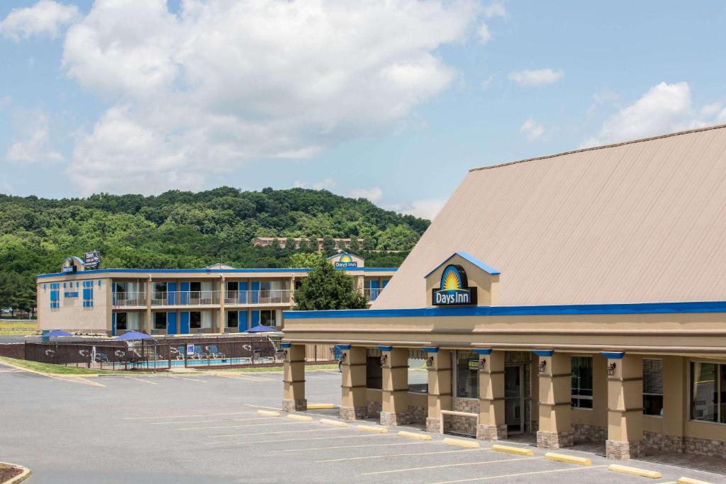 an empty parking lot in front of a hotel at Days Inn by Wyndham Staunton in Staunton