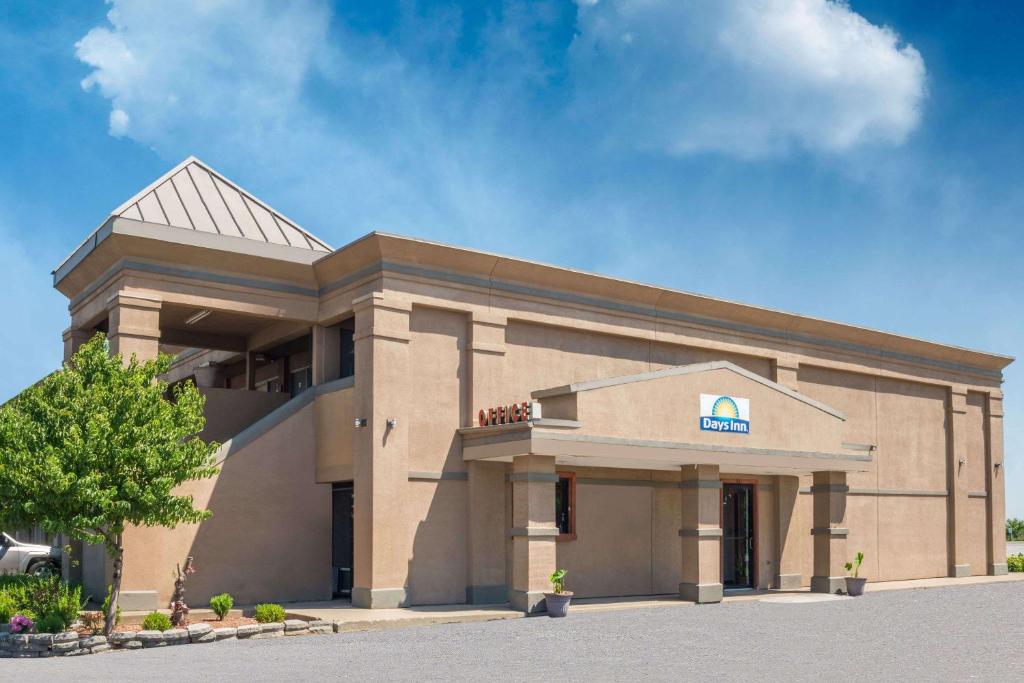 a building with a sign on the front of it at Days Inn by Wyndham Mt. Sterling in Mount Sterling