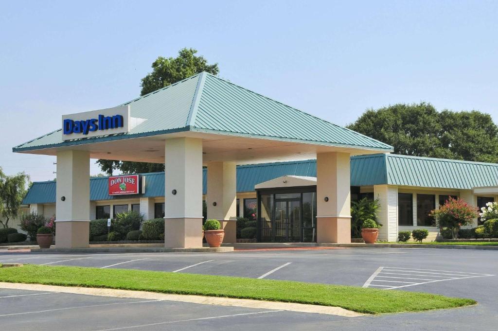 a davis gas station in a parking lot at Days Inn by Wyndham Forrest City in Forrest City