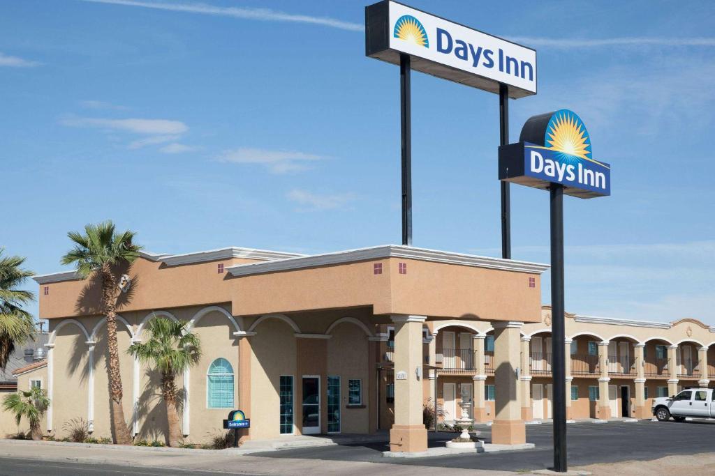 a sign in front of a day inn at Days Inn by Wyndham El Centro in El Centro