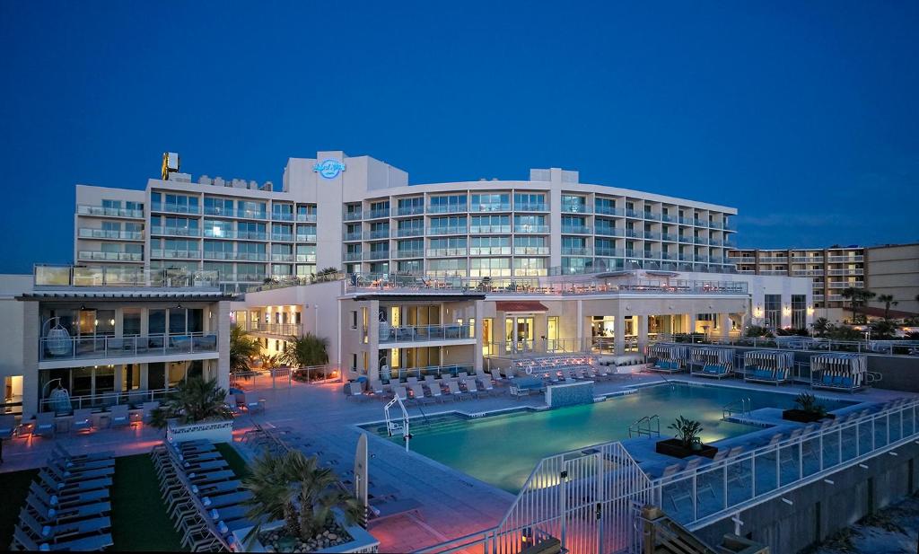 a large building with a large pool of water at Hard Rock Hotel Daytona Beach in Daytona Beach