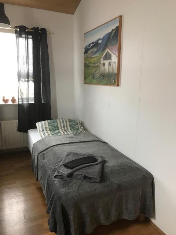 Postel nebo postele na pokoji v ubytování Eiði Farmhouse