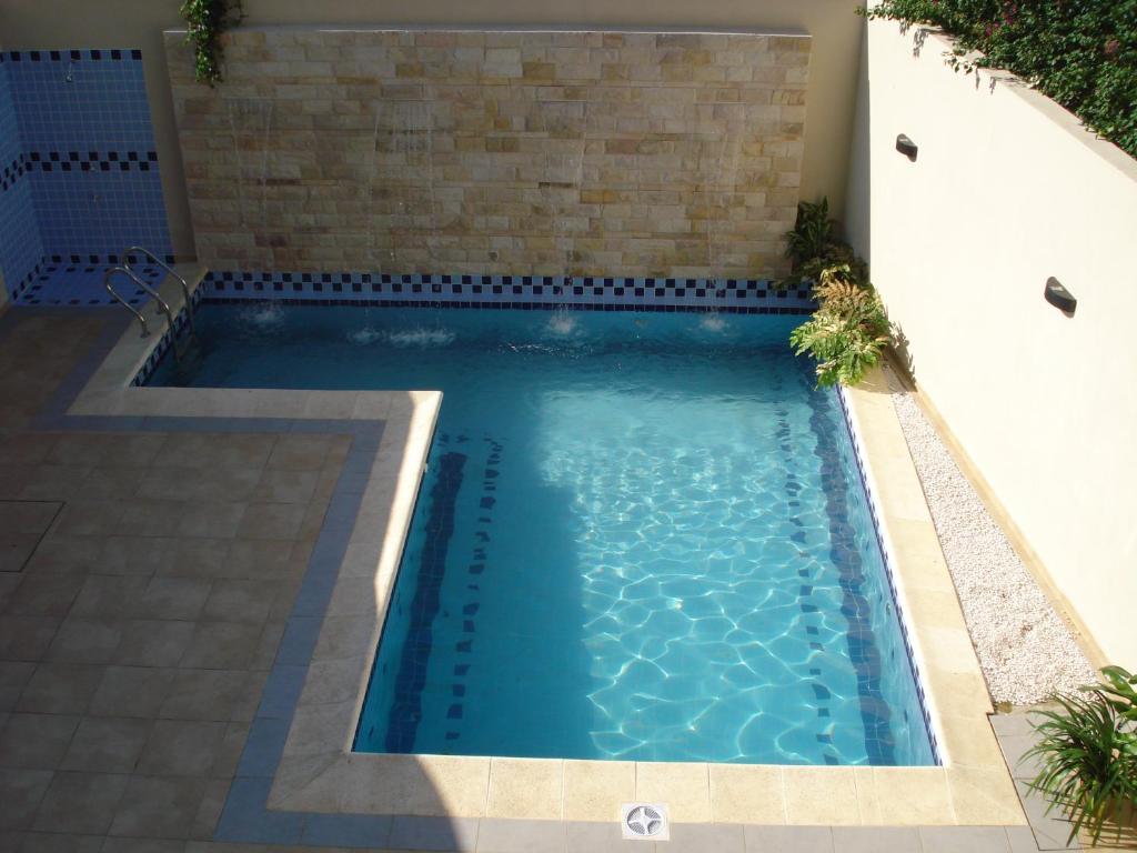 Πισίνα στο ή κοντά στο Olimpo Hotel & Suites