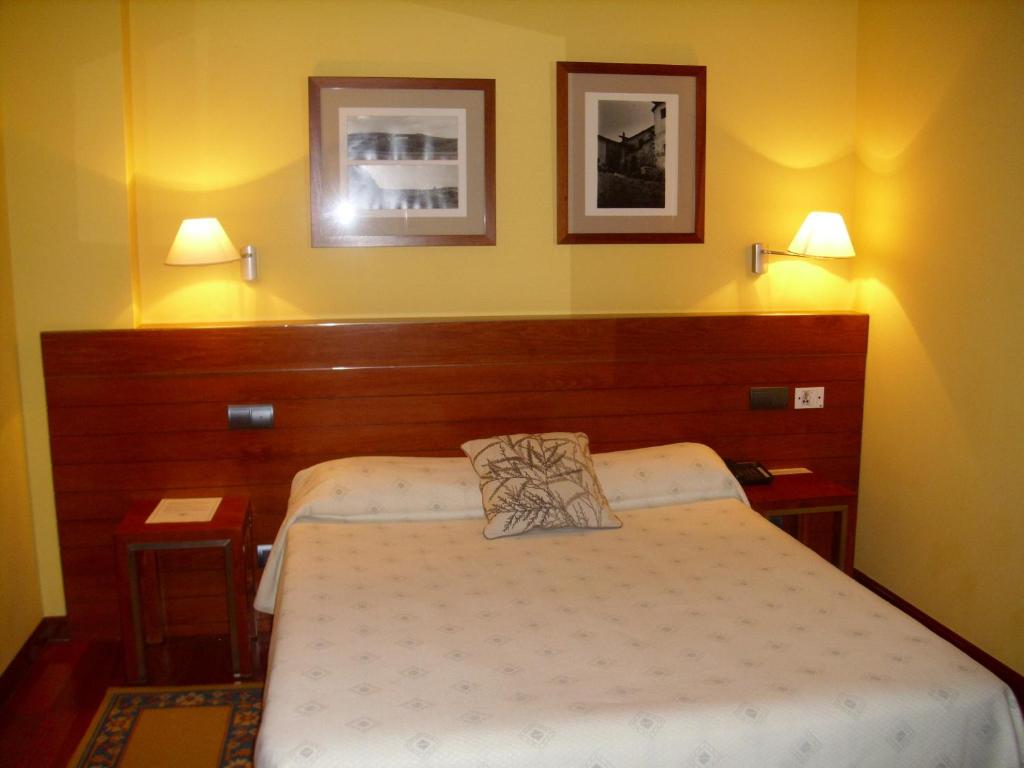 Postel nebo postele na pokoji v ubytování Hotel Rural Vado del Duratón
