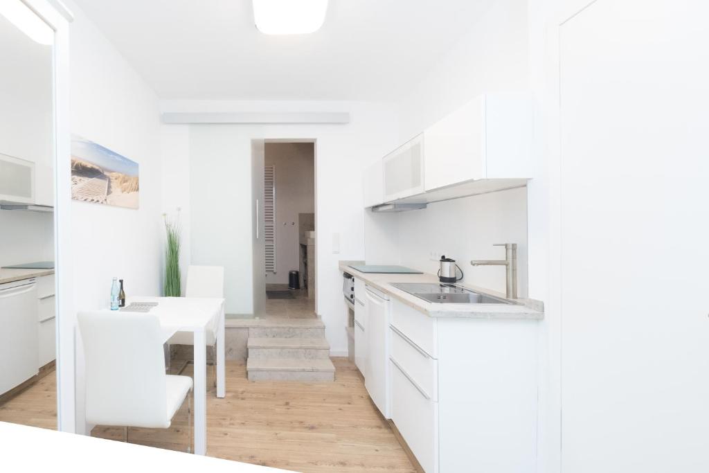 Kuchyň nebo kuchyňský kout v ubytování Miniapartment am Dalberg