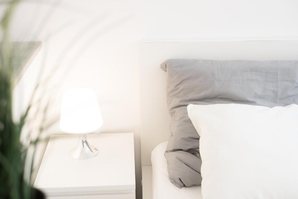 Postel nebo postele na pokoji v ubytování Miniapartment am Dalberg