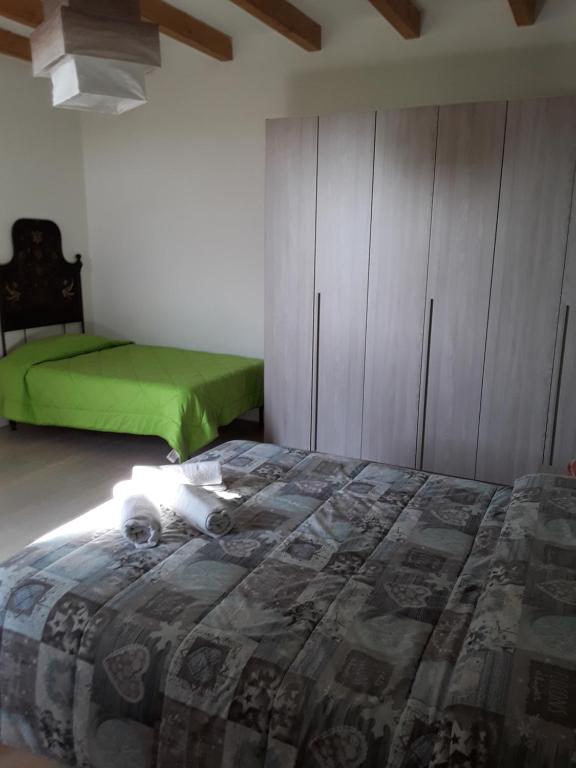 Postel nebo postele na pokoji v ubytování Mu & Mu