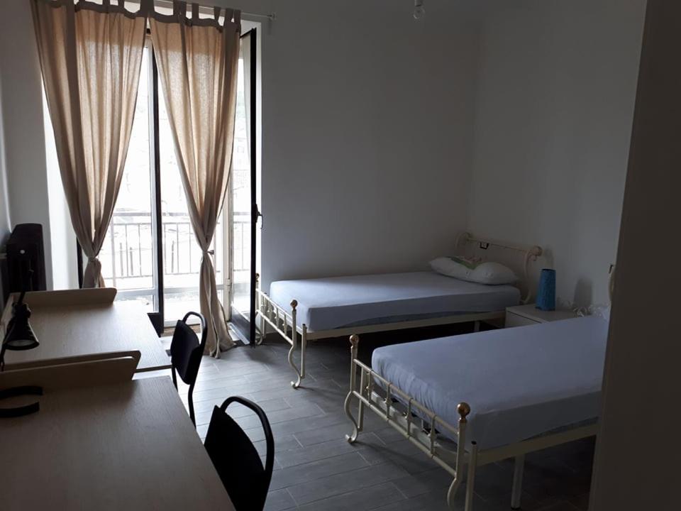 Katil atau katil-katil dalam bilik di Porta Maia