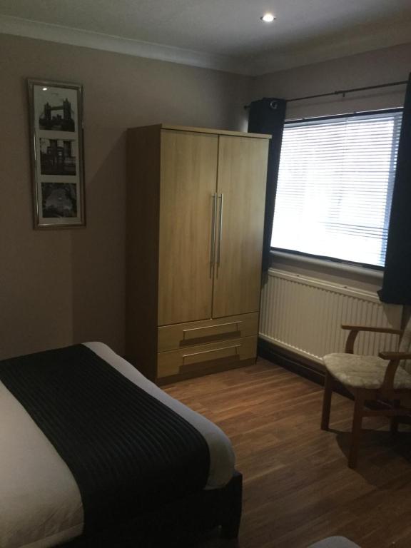 TV a/nebo společenská místnost v ubytování Lakeland Guest House