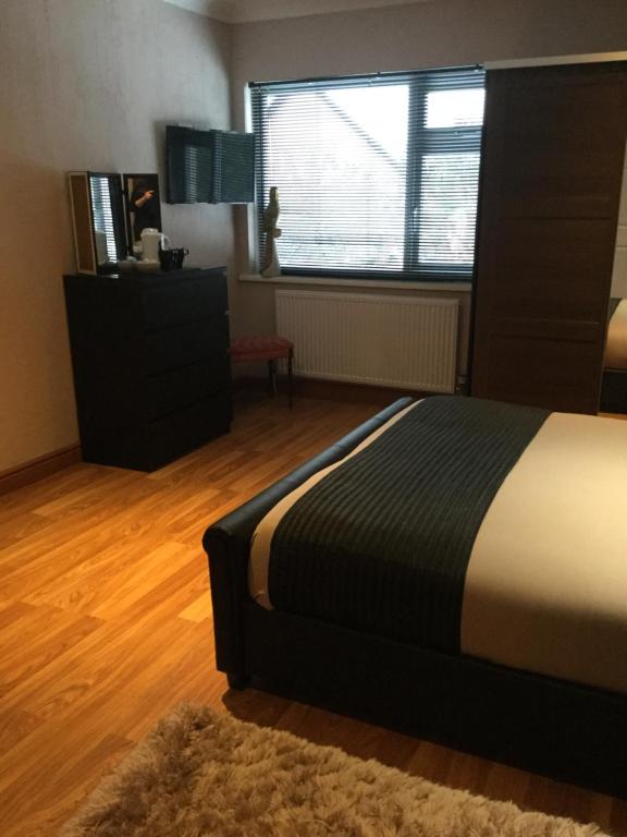 Postel nebo postele na pokoji v ubytování Lakeland Guest House