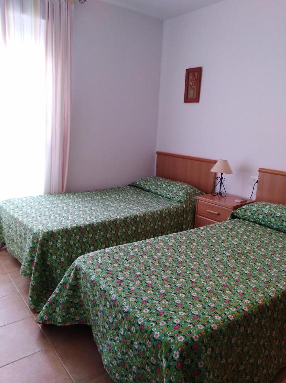 Posteľ alebo postele v izbe v ubytovaní Casa Adosada Entre Almendros