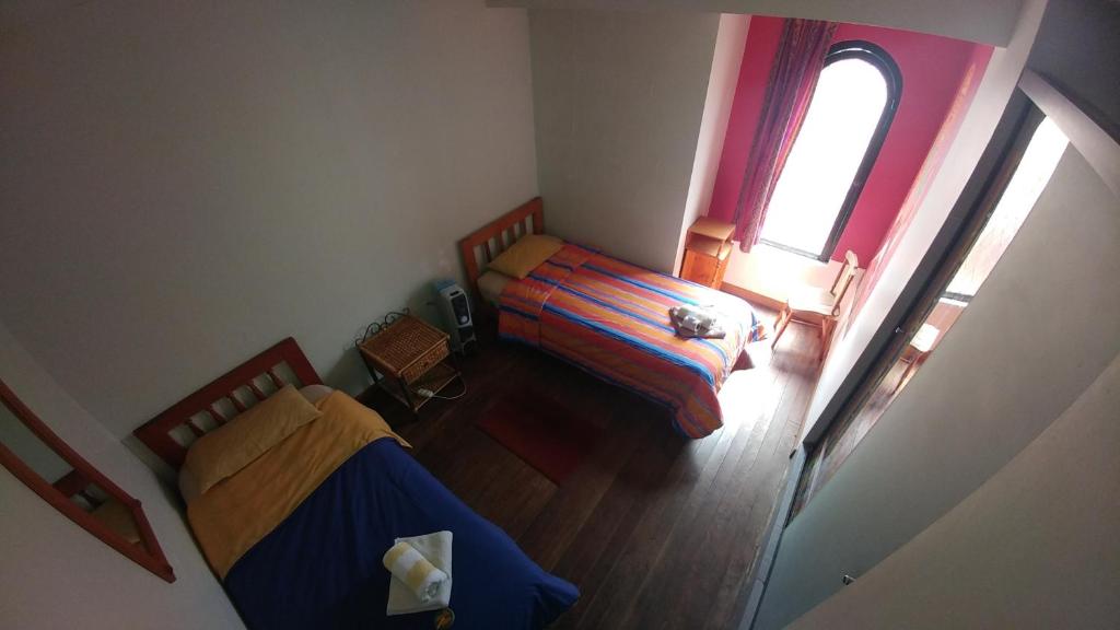 Postel nebo postele na pokoji v ubytování Anata Hostal