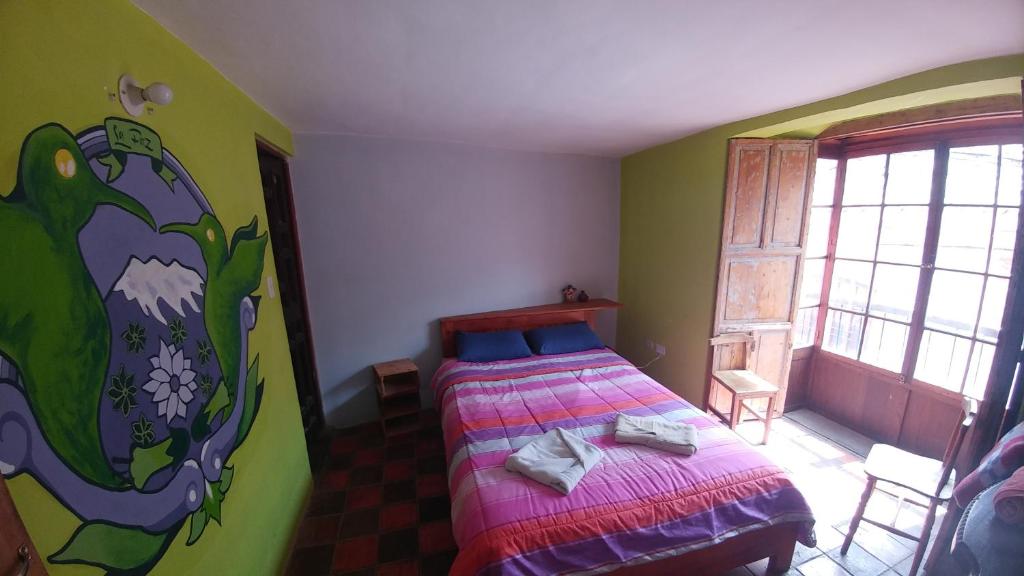 Postel nebo postele na pokoji v ubytování Anata Hostal