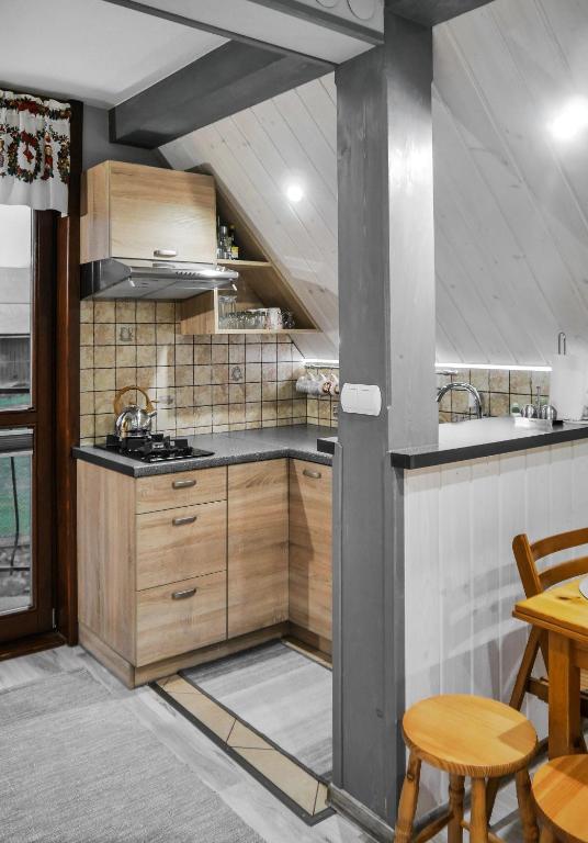Kuchyňa alebo kuchynka v ubytovaní Apartamenty u Grażyny