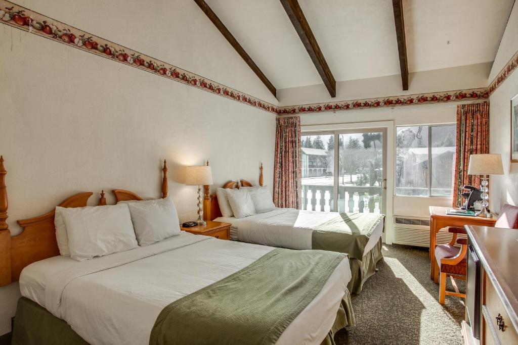 Postel nebo postele na pokoji v ubytování Der Ritterhof Inn