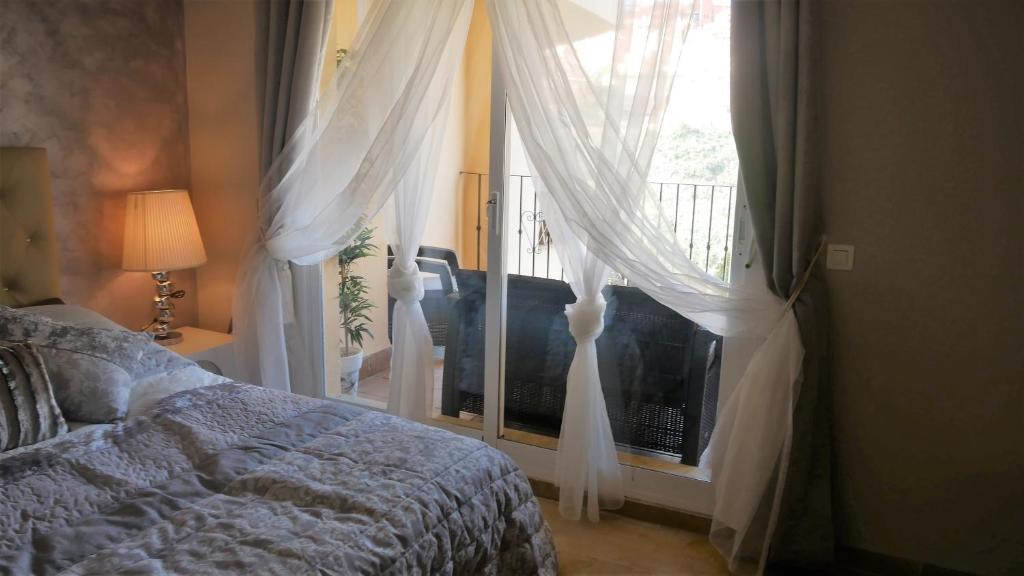 Posteľ alebo postele v izbe v ubytovaní Appartement Hillside Suite
