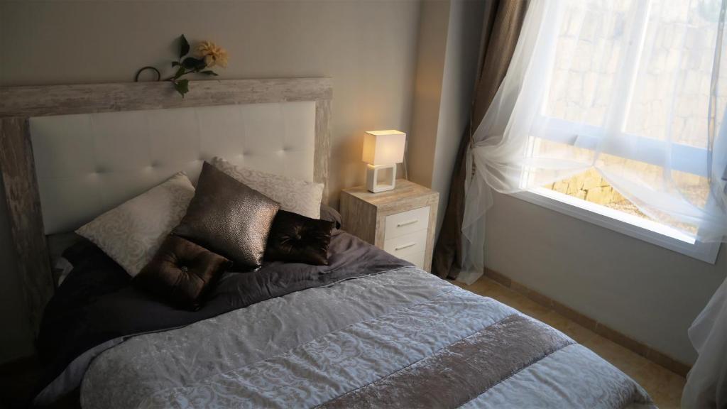 Posteľ alebo postele v izbe v ubytovaní Appartement Hillside Suite