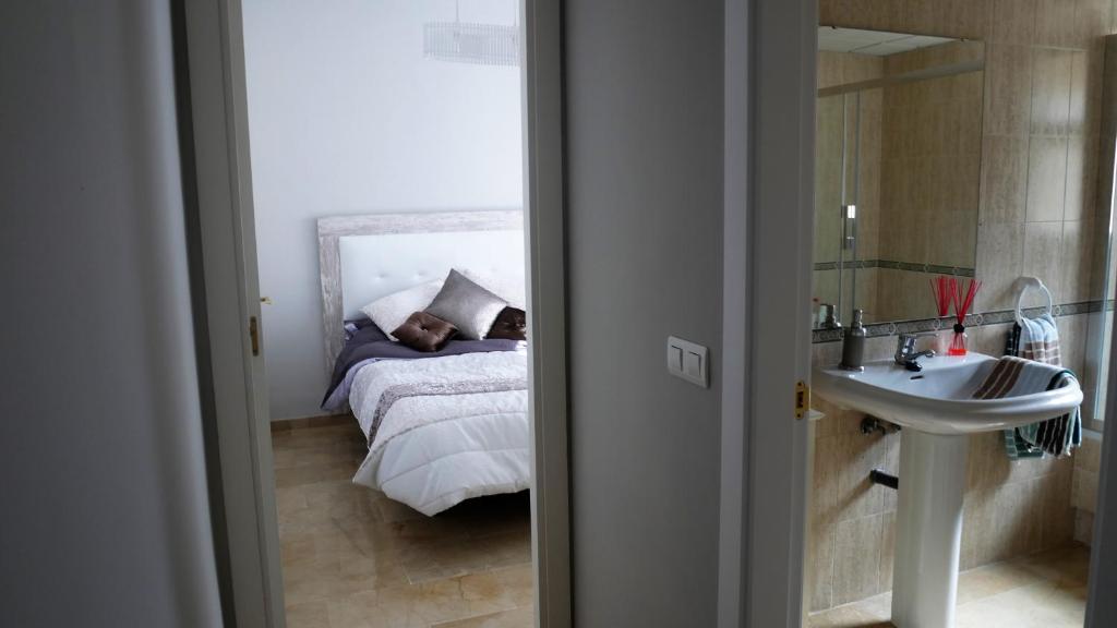 Posteľ alebo postele v izbe v ubytovaní Appartement Hillside Suite