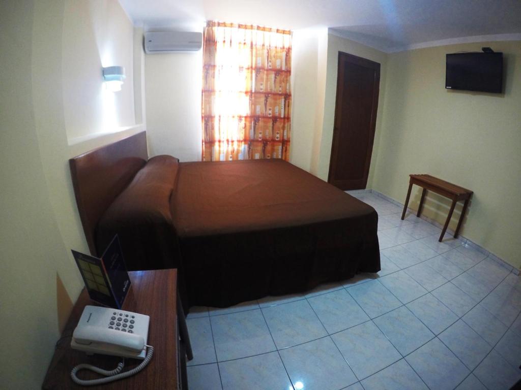 TV a/nebo společenská místnost v ubytování Hotel Oriente