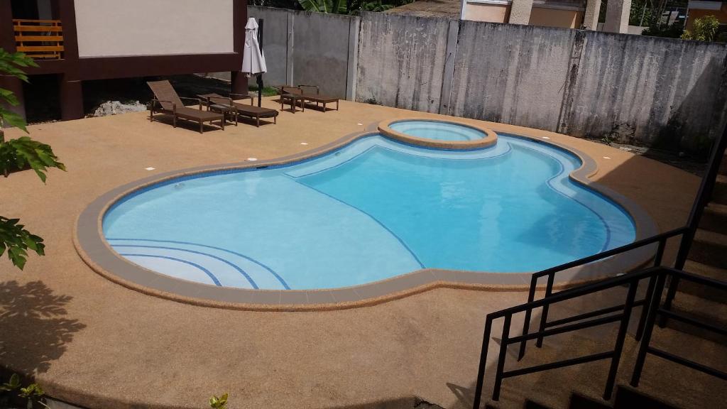 Bazén v ubytování Infinity Sands Resort nebo v jeho okolí