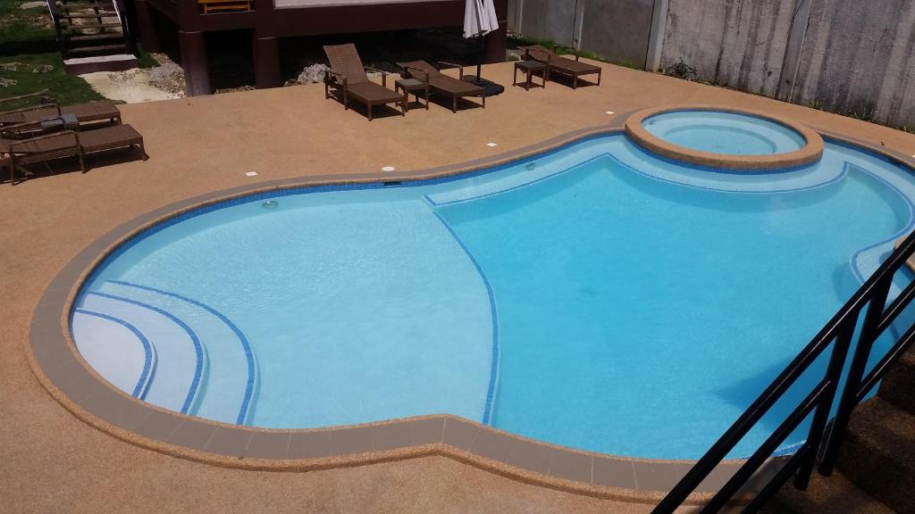Bazén v ubytování Infinity Sands Resort nebo v jeho okolí