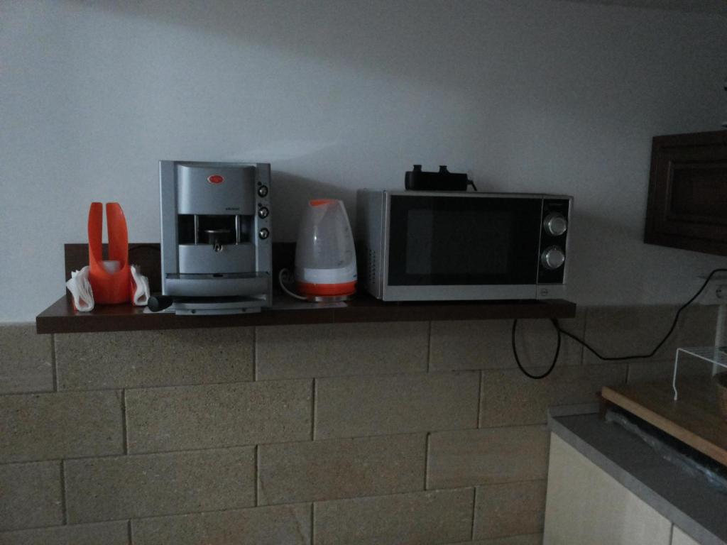 Kuchyň nebo kuchyňský kout v ubytování La Corte piccola