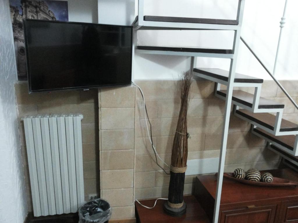 TV a/nebo společenská místnost v ubytování La Corte piccola