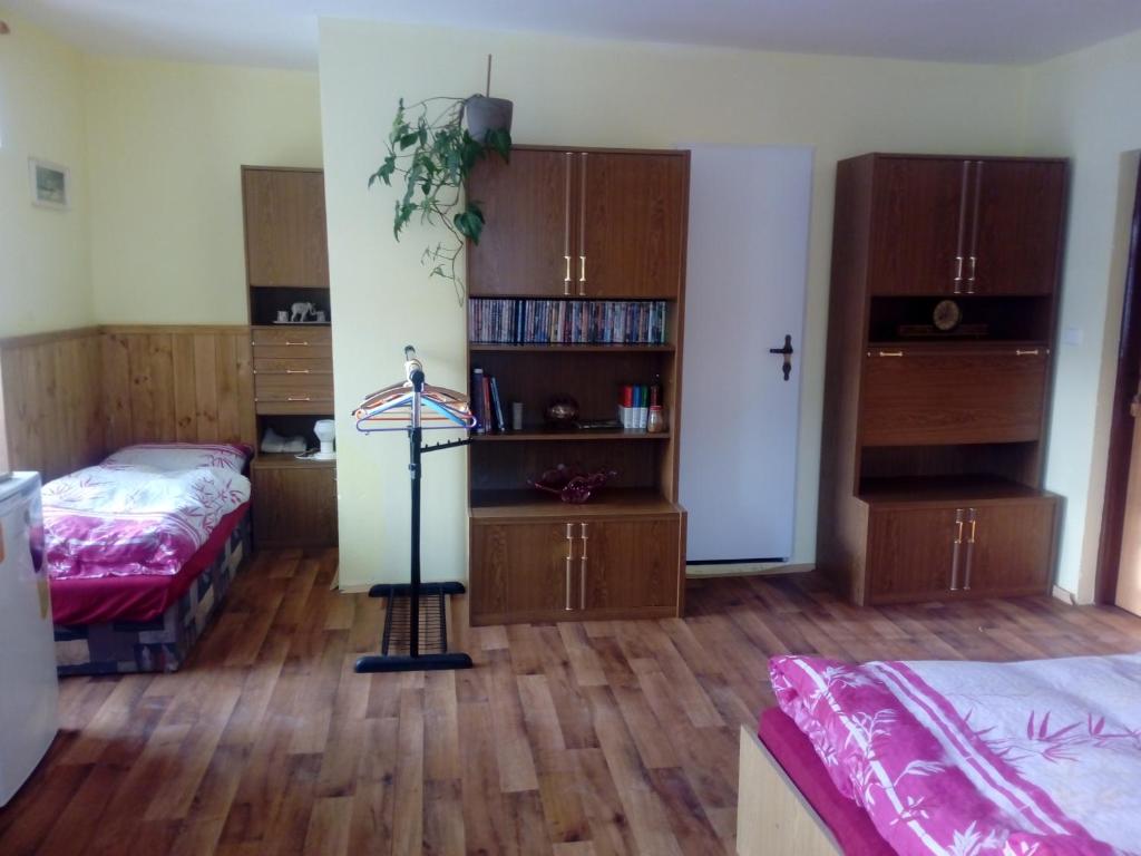 Postel nebo postele na pokoji v ubytování Penzion SKLAŘSKÁ HOSPODA