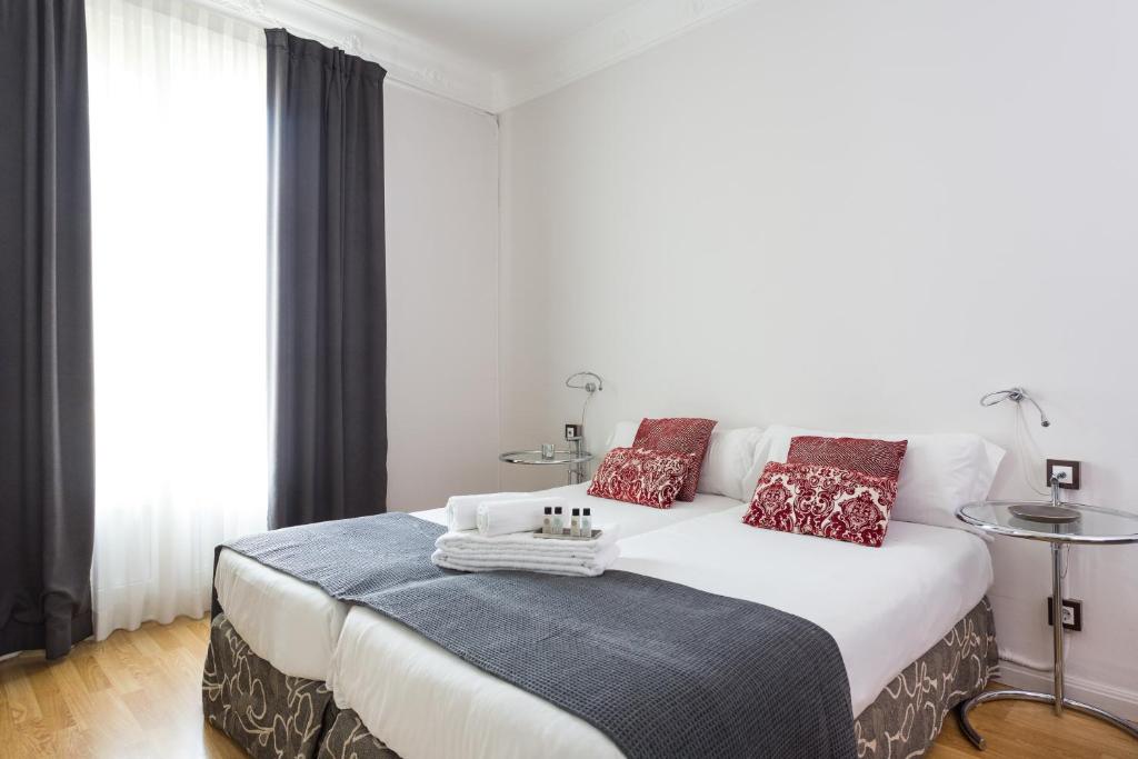 Posteľ alebo postele v izbe v ubytovaní Quartprimera Apartments