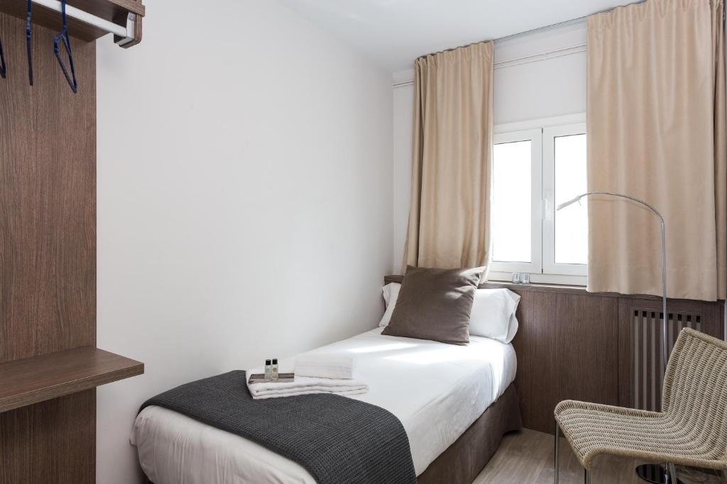 Posteľ alebo postele v izbe v ubytovaní Quartprimera Apartments