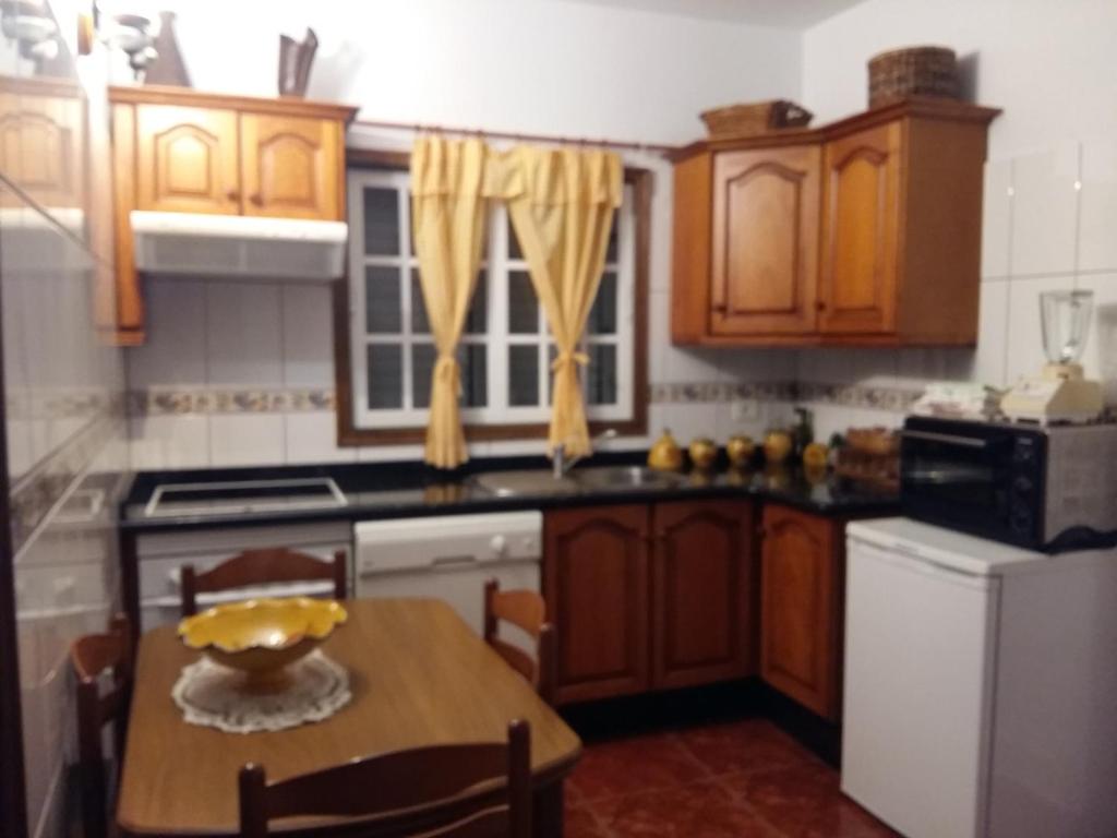 Kuchyň nebo kuchyňský kout v ubytování Apartamento la era