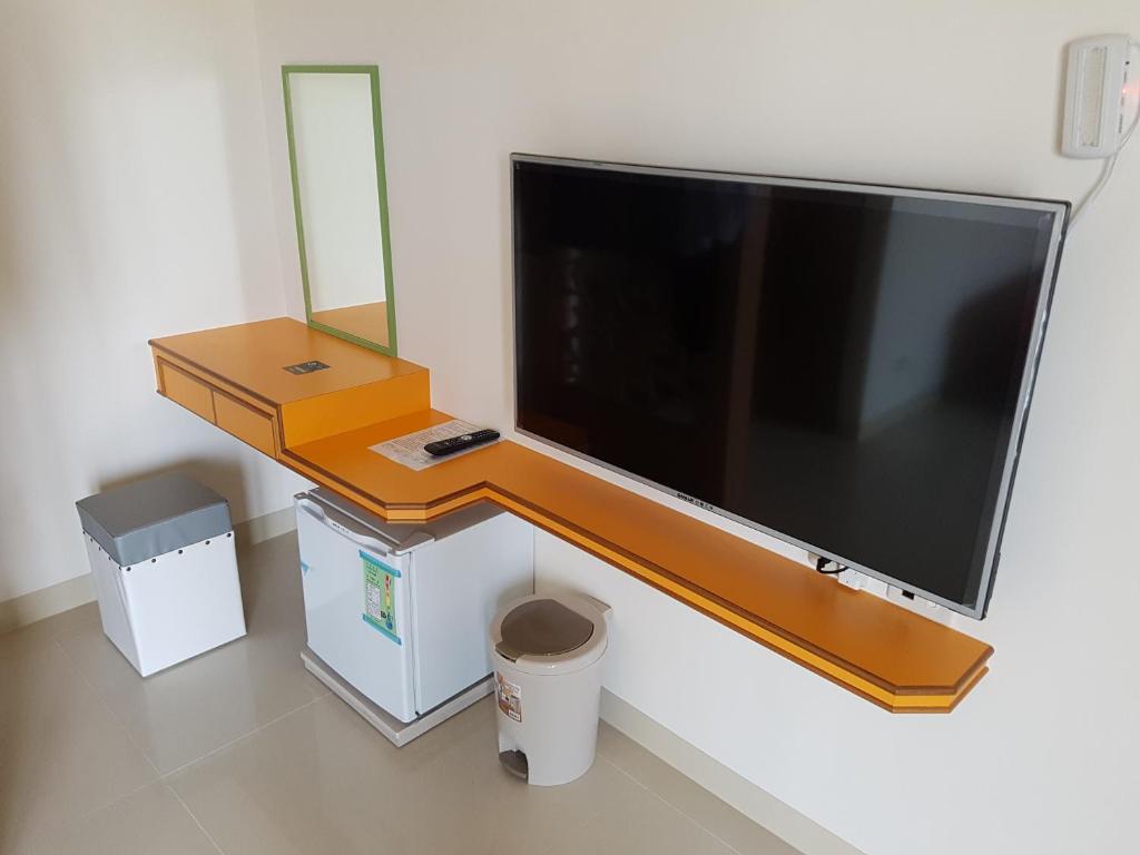 TV a/nebo společenská místnost v ubytování Caibei Homestay