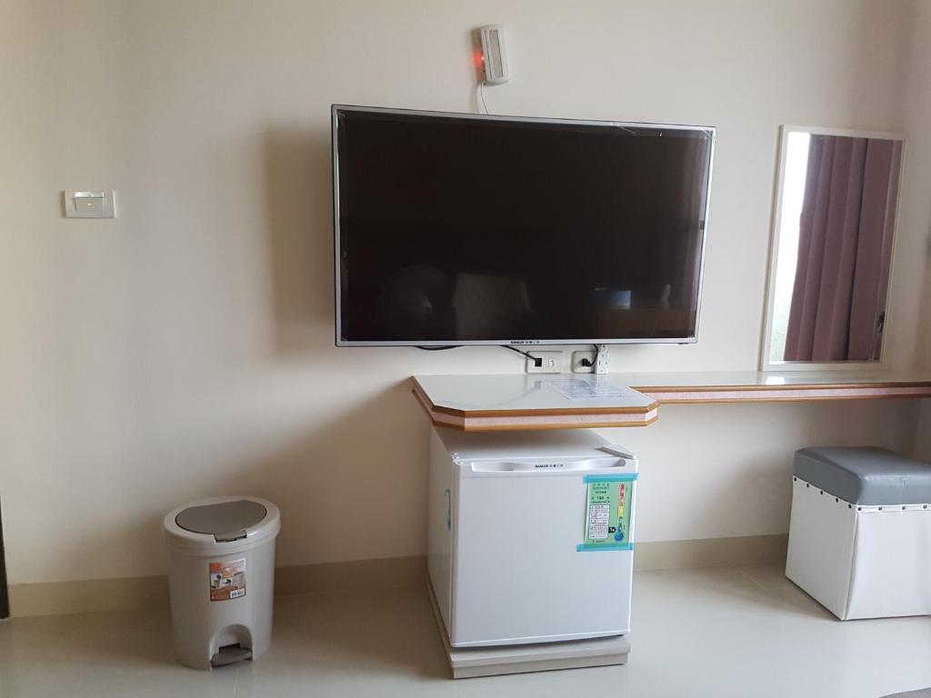 TV a/nebo společenská místnost v ubytování Caibei Homestay